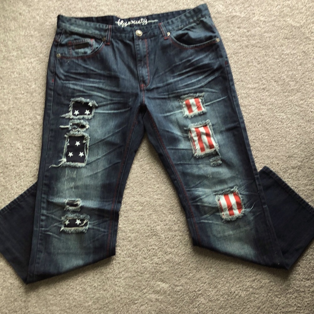 FLY SOCIETY USA FLAG PRINT RELAXED FIT DISTRESSED BLUE JEANS. 38